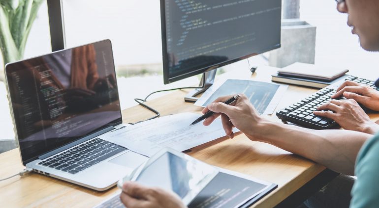 writing-codes-typing-data-code-technology-programmer-cooperating-working-web-site-project-software-developing-desktop-computer-company-programming-with-html-php-javascript (1)
